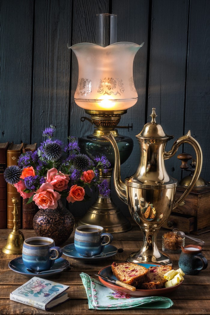 Still-life with kerosene lamp, coffee, and flowers