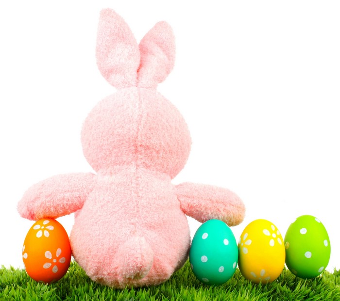 Pink Easter Bunny with Decorated Eggs on Grass