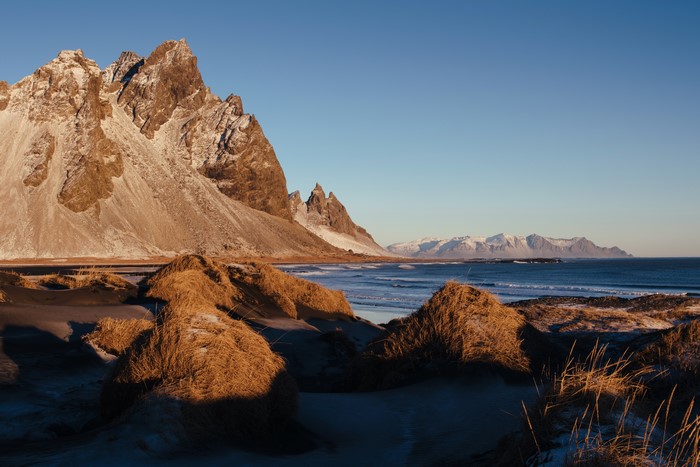 Icelandic Coastline with Jagged Mountains and Dunes
