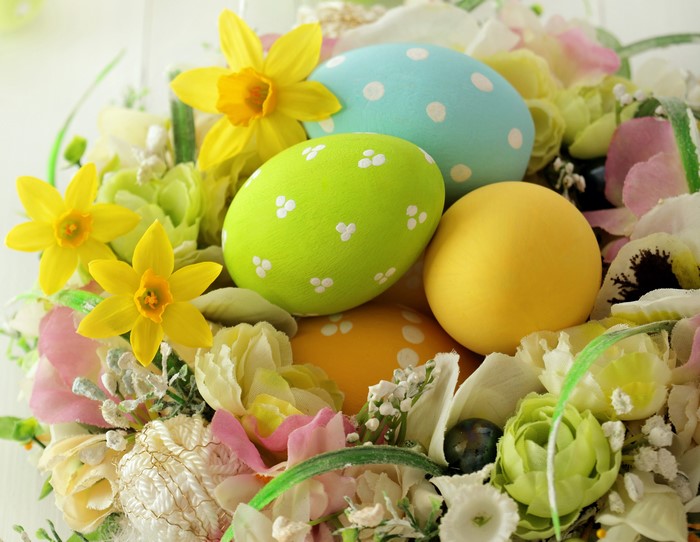 Easter eggs and daffodils in a floral arrangement