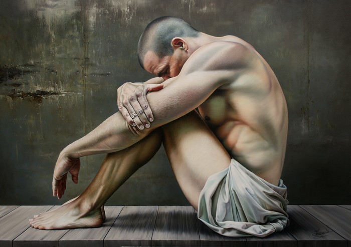 Man sitting on wooden planks, Christiane Vleugels