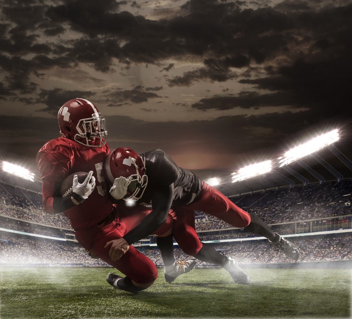 American football players in a stadium