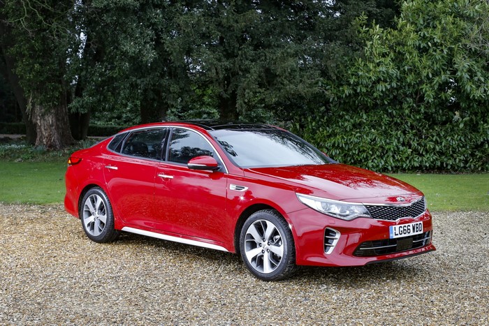 Red 2017 Kia Optima GT Line S parked on gravel