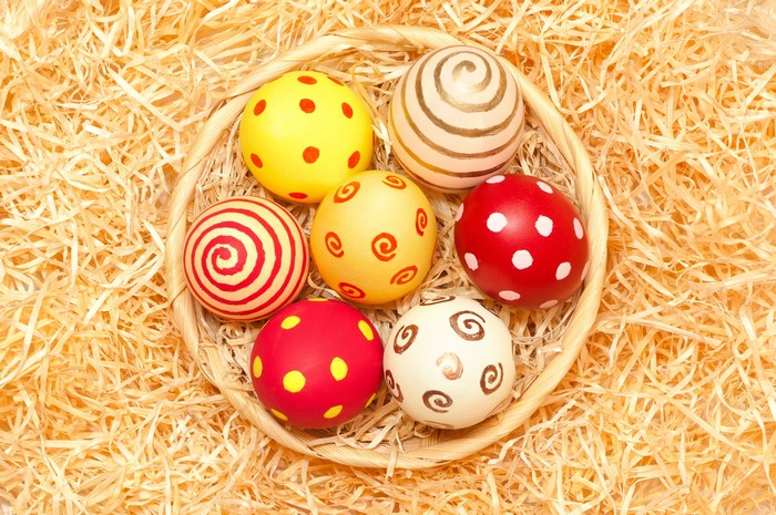 Easter Eggs in a Basket on Straw