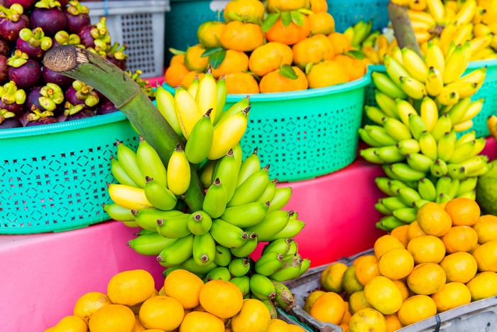 Bananas, Mangosteens, and Oranges at a Fruit Stand