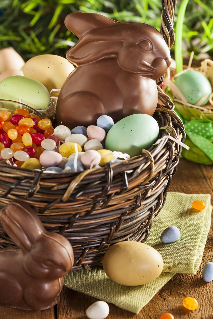 Easter chocolate bunnies and eggs in a wicker basket