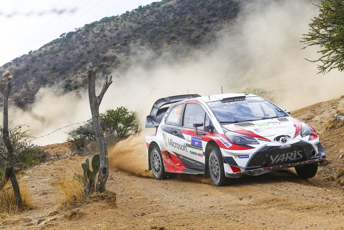 Toyota Yaris WRC rally car on dirt road