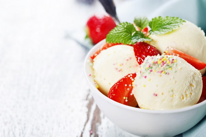 Ice cream with strawberries and sprinkles