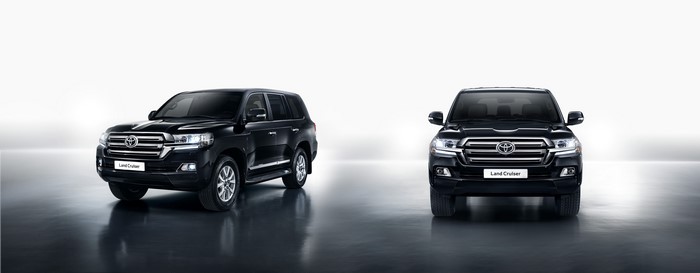 Two black Toyota Land Cruiser SUVs