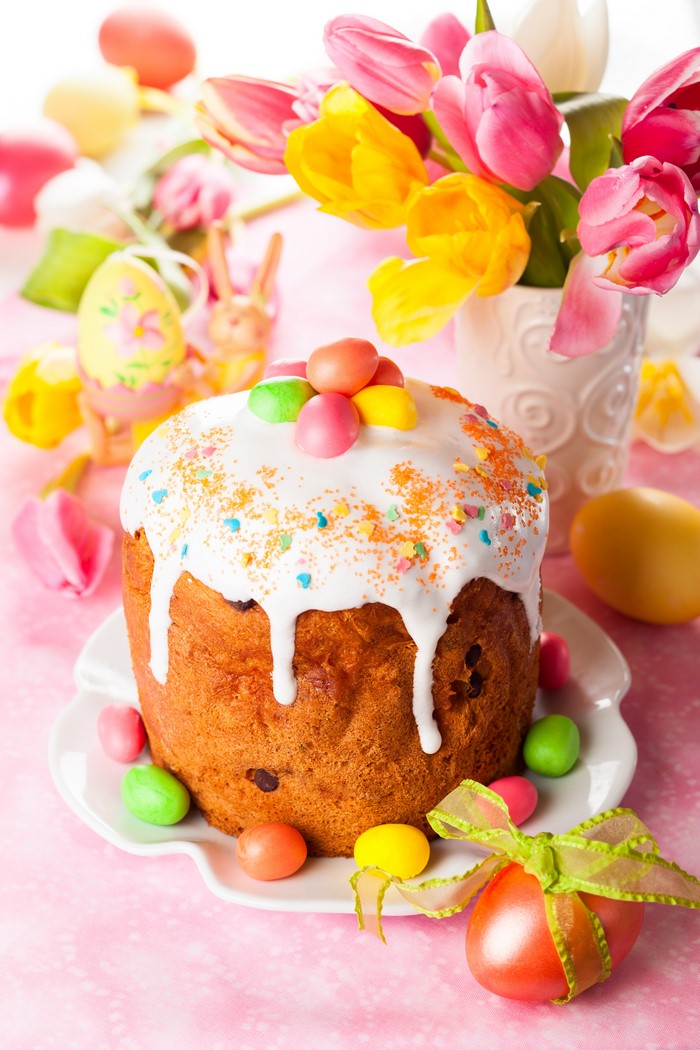 Easter Kulich with Icing and Candied Eggs and Tulips