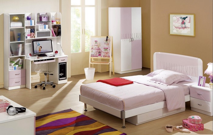 Children's bedroom with bed, desk, and wardrobe