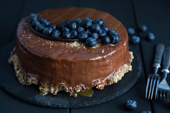 Chocolate cake with blueberries and caramel