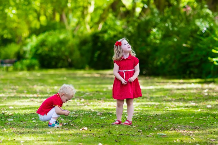 Two children playing in a park
