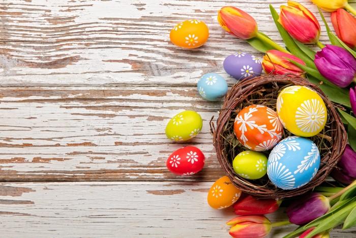Easter Eggs and Tulips on Wood Planks
