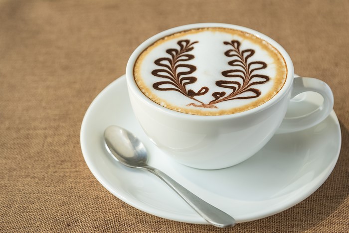 Cappuccino with Chocolate Art and Spoon