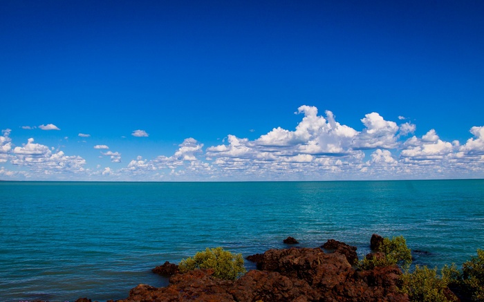 Ocean and Sky with Rocky Shoreline
