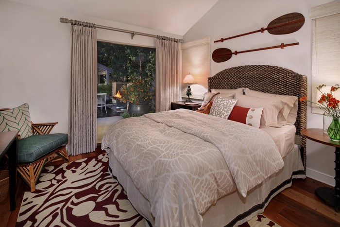 Bedroom with a view of an outdoor patio