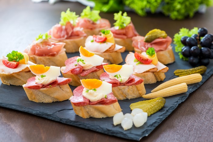 Assortment of Appetizers on a Slate Platter