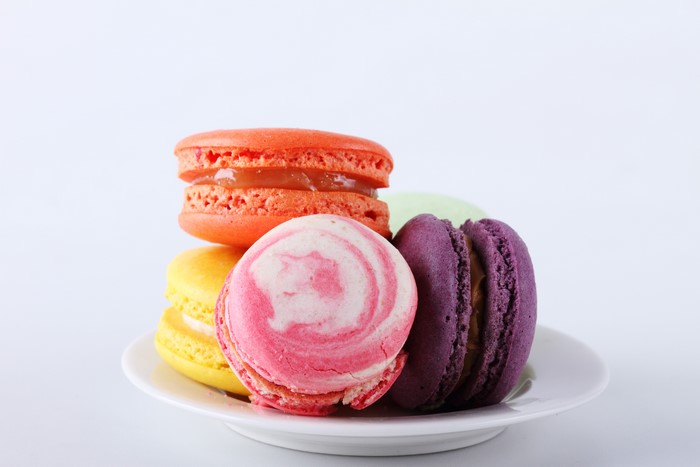 Multicolor Macarons on a White Plate