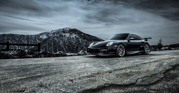Black Porsche 911 Carrera Turbo on Mountain Road