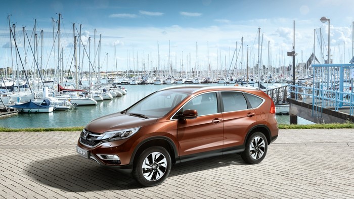 Brown Honda CR-V 2015 CIS-spec parked by a marina