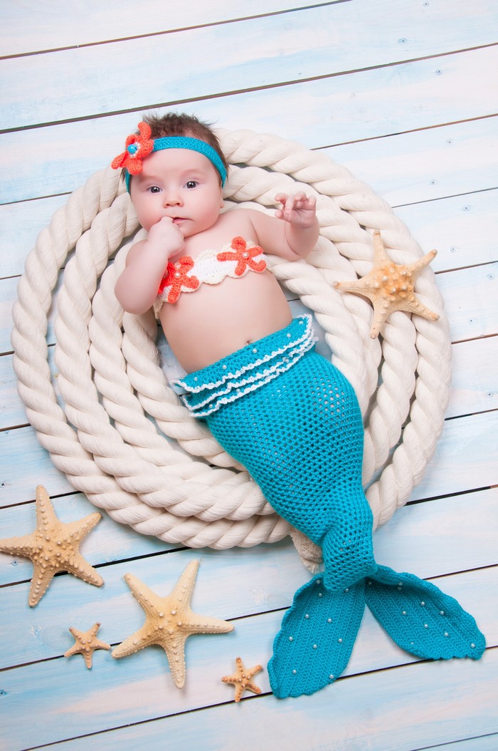 Baby in Mermaid Costume with Starfish