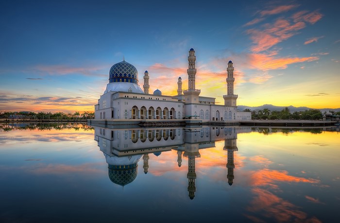 Likas Mosque in Kota Kinabalu, Malaysia at sunset with reflection