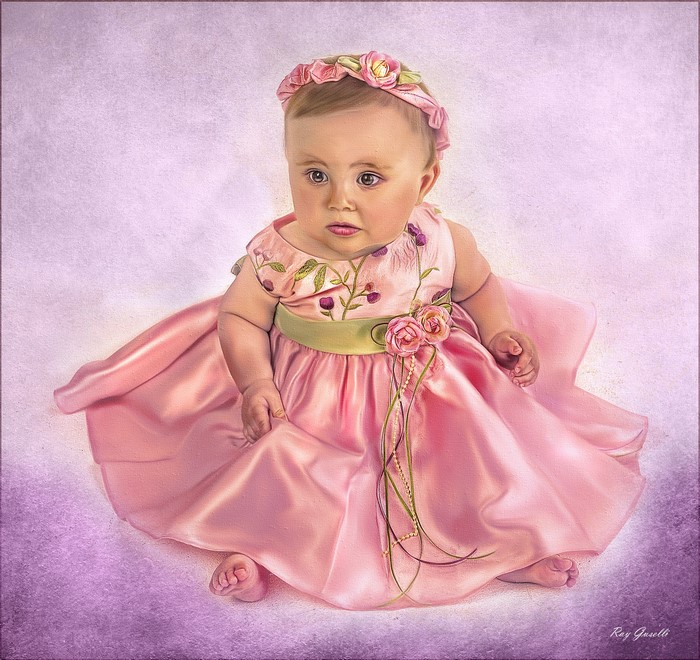 Baby girl in a pink dress and flower crown