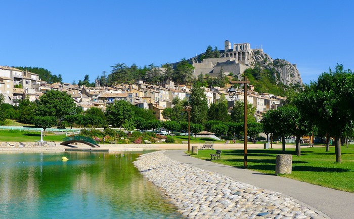 Sisteron, France with a pond and castle