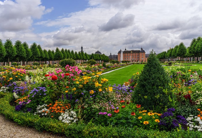 Schlossgarten Schwetzingen with colorful flower beds and palace