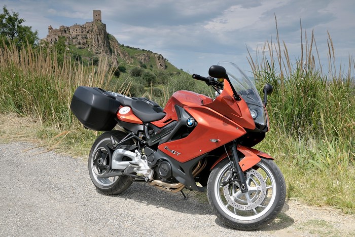 BMW F 800 GT motorcycle with castle ruins