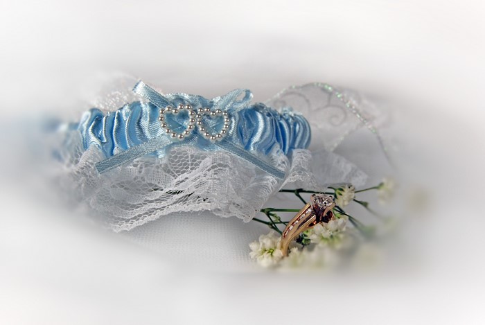 Blue garter with heart detail and diamond ring