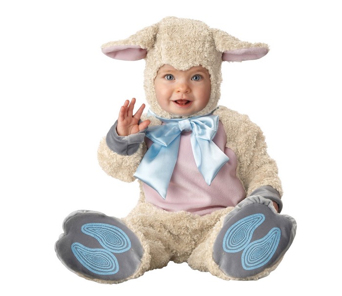 Baby in a sheep costume waving