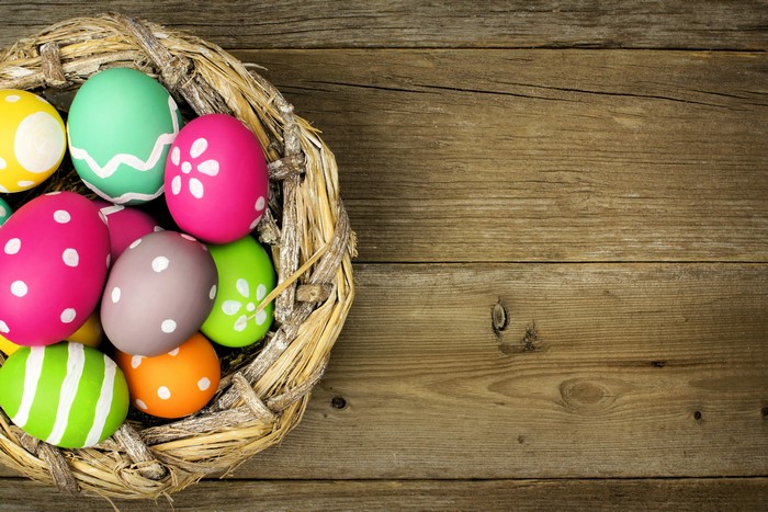Easter Eggs in a Nest on Wood Planks
