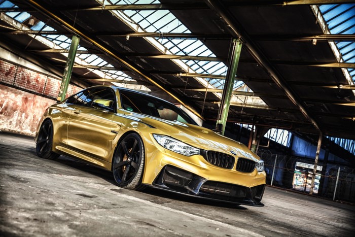 Gold BMW F82 M4 Coupe with Carbonfiber Dynamics