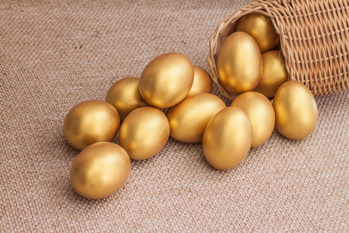Golden Easter Eggs spilling from a basket