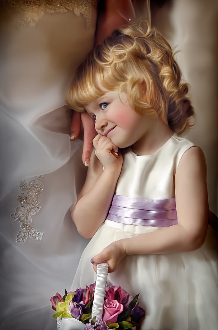 Flower girl with blonde curly hair holding a basket