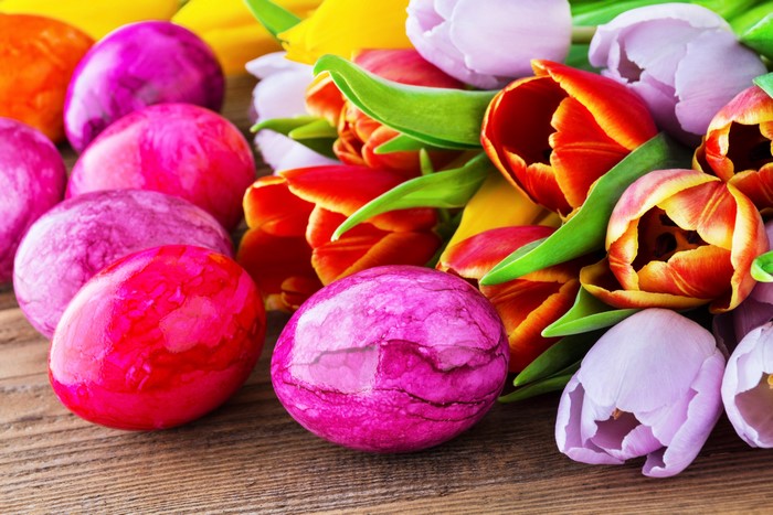 Easter Eggs and Tulips on Wood Planks