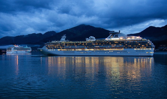 Two cruise liners at sea in the evening