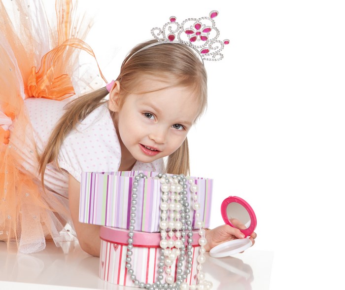 Little girl with crown and jewelry