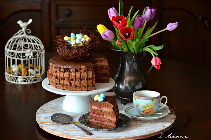Easter chocolate cake with tulips and coffee