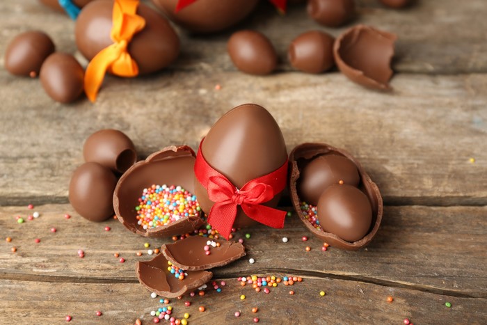 Chocolate Easter Eggs with Sprinkles on Wood