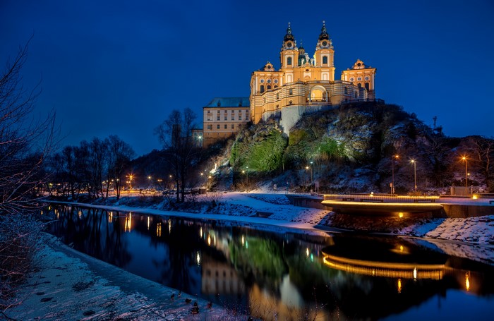Stift Melk Monastery on a Crag over a River at Night