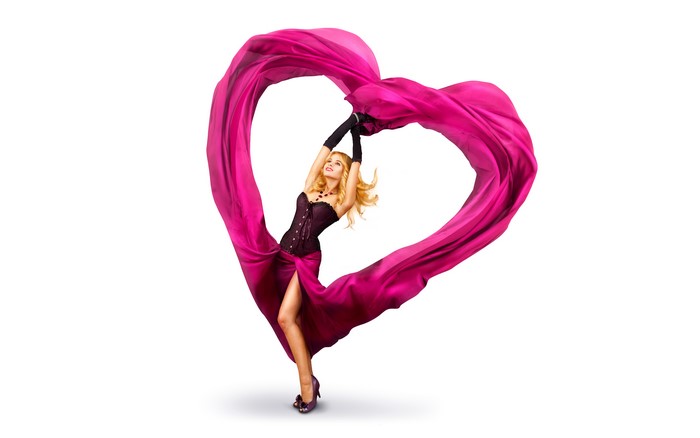 Woman in corset with pink heart fabric
