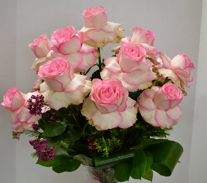Bouquet of pink and white roses with glitter