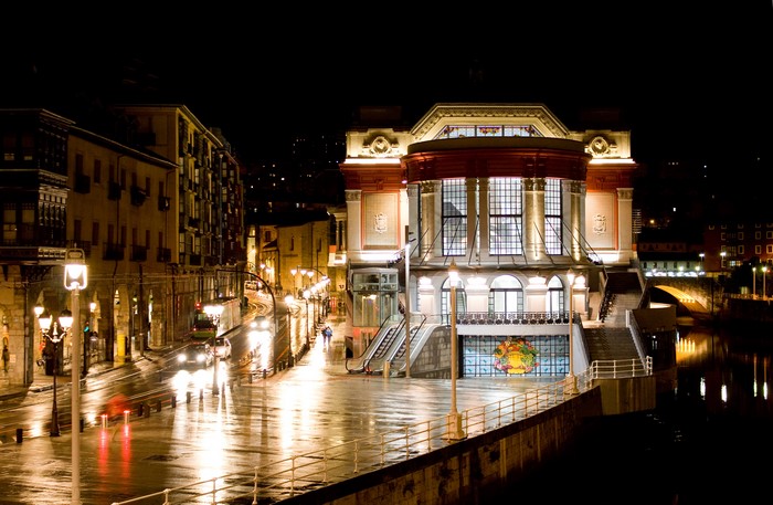 Street scene at night in Bilbao, Spain