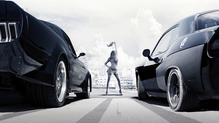 Woman between two cars, Fast & Furious 8