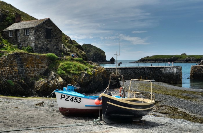 Mullion Cove, Cornwall: Stone House and Boats on Shore