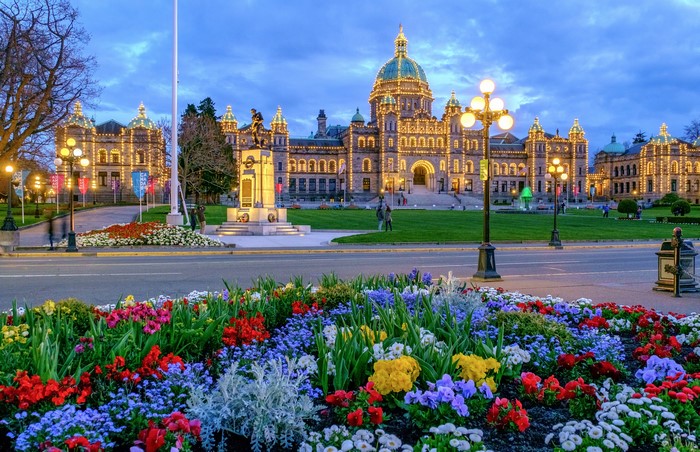 Parliament Buildings Victoria BC at Dusk with Flowers
