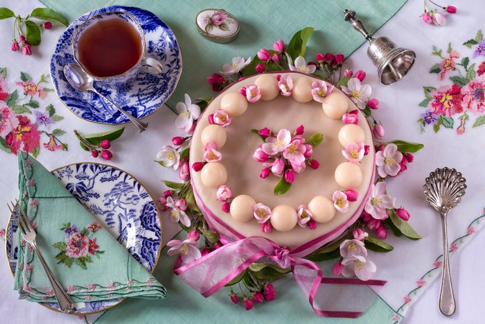 Tea set with cake and flowers